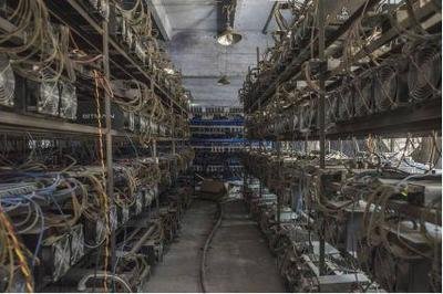 A modern mining farm with rows of high-powered mining rigs